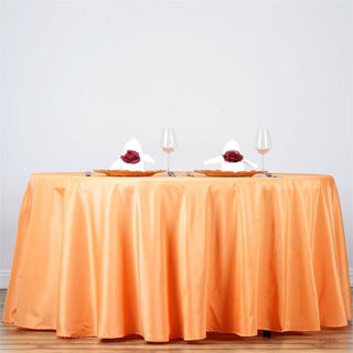 Add Elegance to Your Event with the Orange Round Tablecloth