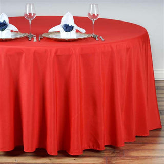 Enhance Your Event Decor with the 132" Red Seamless Polyester Round Tablecloth