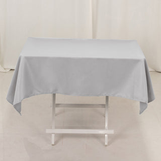 <span>Elegant Silver Polyester Square Tablecloth</span> <span>Elegant Silver Polyester Square Tablecloth</span>
