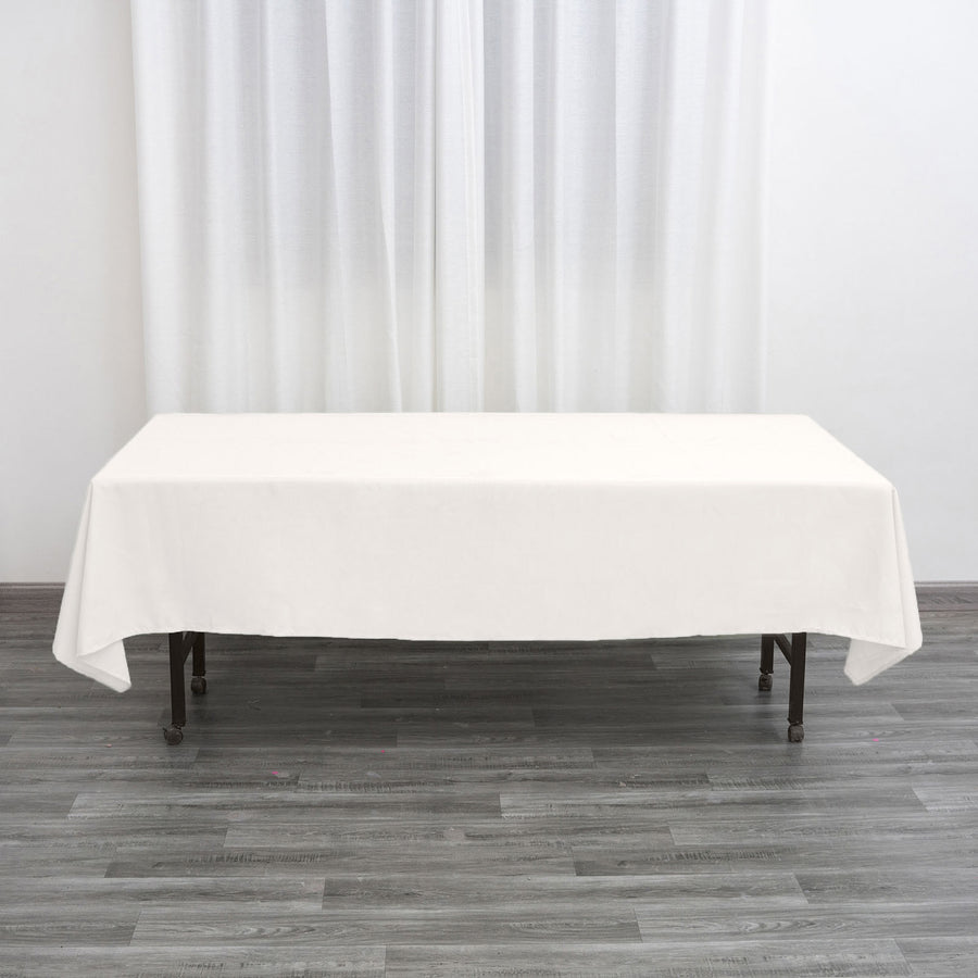 White tablecloth on a table in a bright, airy room.