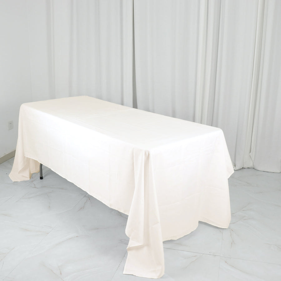 60"x126" Ivory Polyester Rectangular Tablecloth