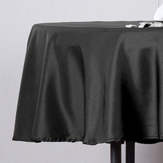 Unleash Your Creativity with the 70" Round Black Seamless Polyester Linen Tablecloth