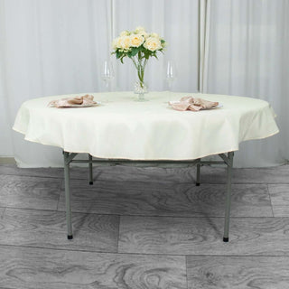 Elevate Your Event with the 70" Ivory Premium Polyester Round Tablecloth Elevate Your Event with the 70" Ivory Premium Polyester Round Tablecloth