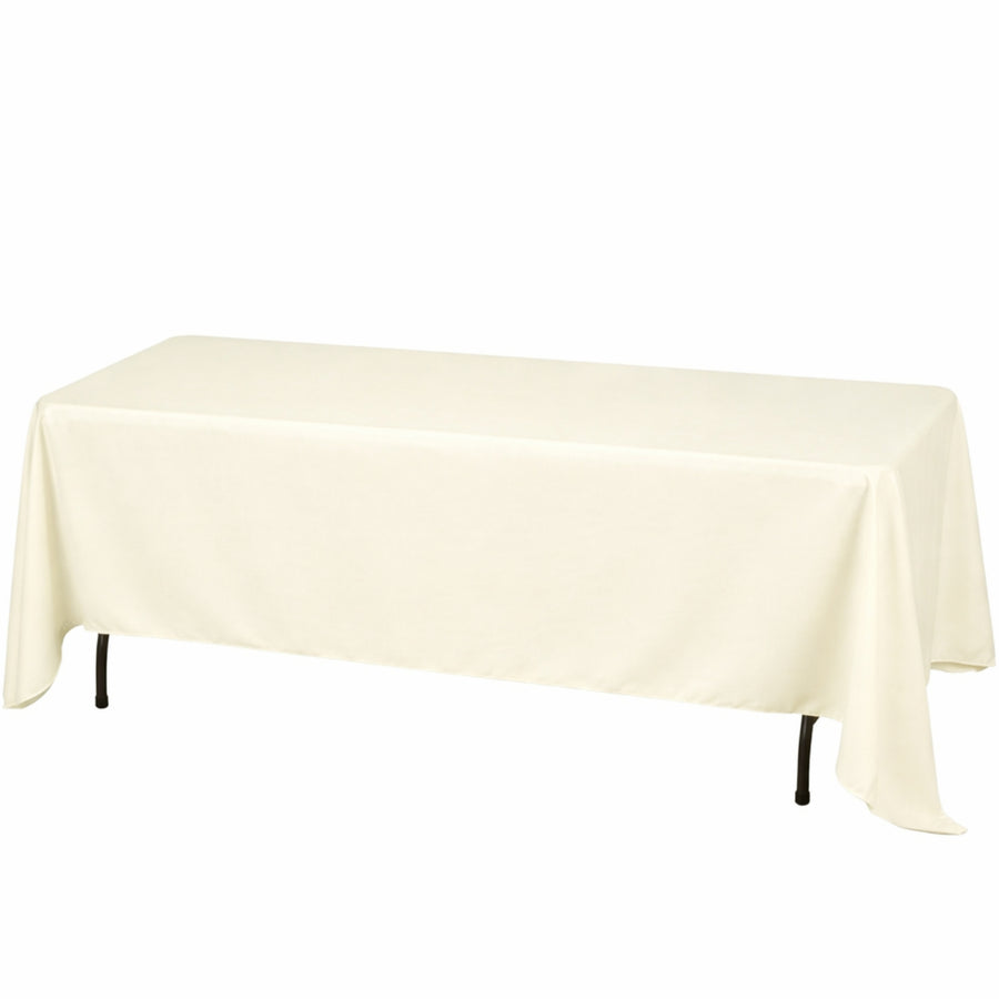Ivory rectangular tablecloth draped over a banquet table