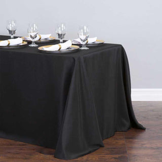 Experience Elegance with the 90"x132" Black Seamless Premium Polyester Rectangular Tablecloth Experience Elegance with the 90"x132" Black Seamless Premium Polyester Rectangular Tablecloth