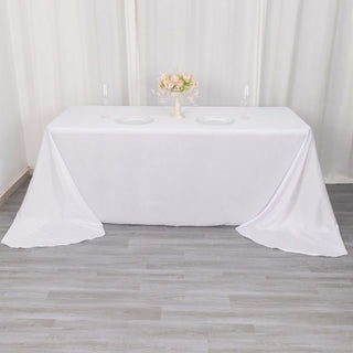 Experience Elegance with the 90"x156" White Seamless Polyester Round Corner Tablecloth Experience Elegance with the 90"x156" White Seamless Polyester Round Corner Tablecloth