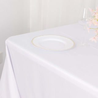 Elevate Your Event with the 90"x156" White Seamless Polyester Round Corner Tablecloth Elevate Your Event with the 90"x156" White Seamless Polyester Round Corner Tablecloth