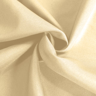 Soft golden fabric with elegant drape and smooth texture. #whtbkgd