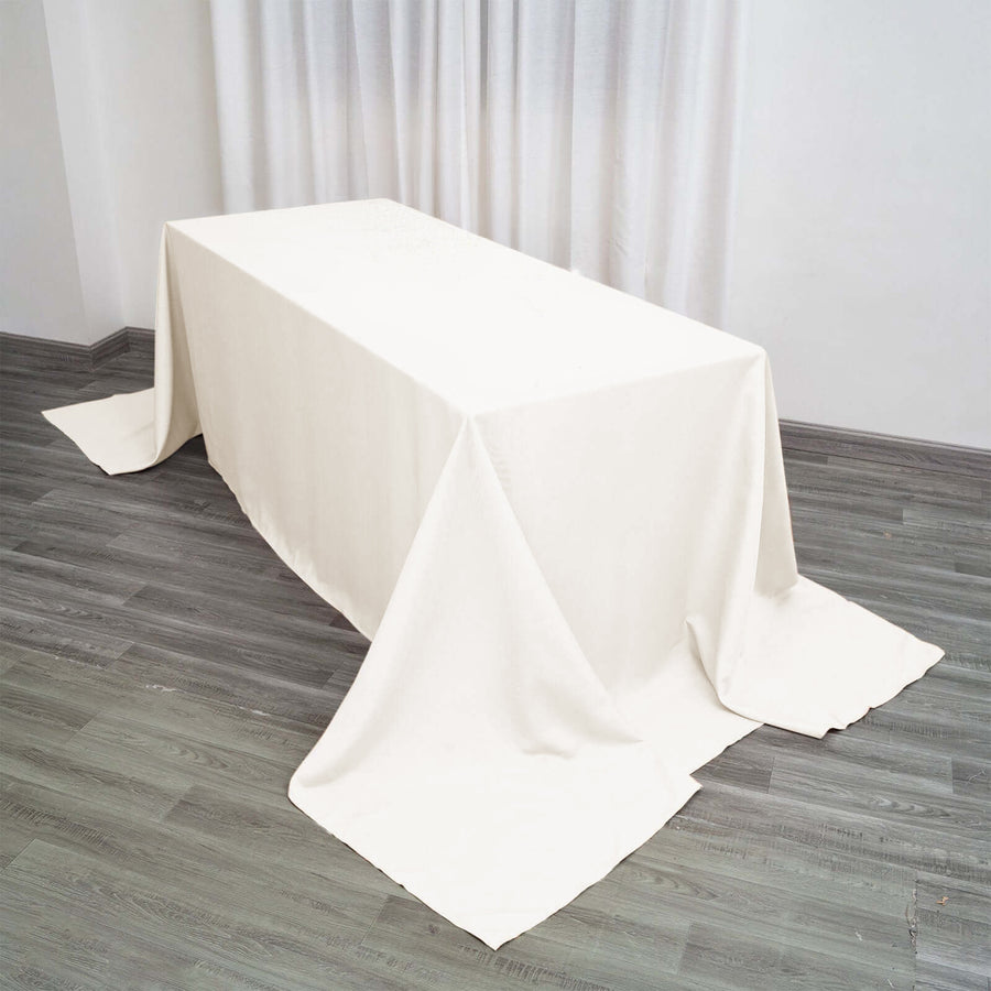 90 Inch x 156 Inch | Ivory Polyester Rectangular Tablecloth | TableclothsFactory