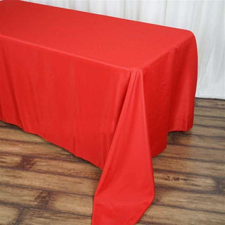 Add Elegance to Your Event with the 90"x156" Red Seamless Polyester Rectangular Tablecloth Add Elegance to Your Event with the 90"x156" Red Seamless Polyester Rectangular Tablecloth