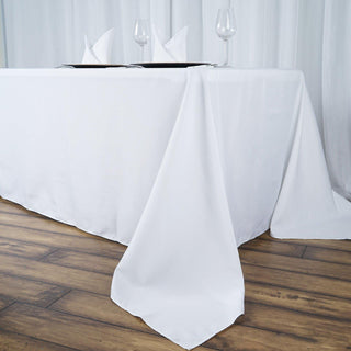 Elevate Your Event with the 90"x156" White Seamless Premium Polyester Rectangular Tablecloth