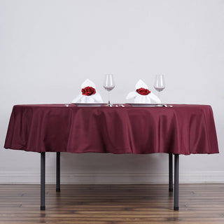 Elevate Your Event with the Burgundy Polyester Round Tablecloth Elevate Your Event with the Burgundy Polyester Round Tablecloth