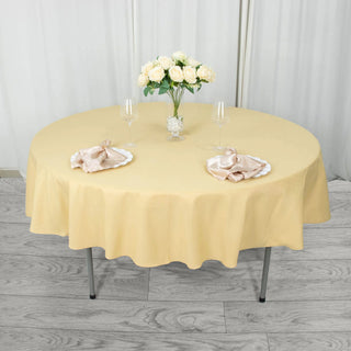 Elevate Your Event with the 90" Champagne Seamless Premium Polyester Round Tablecloth