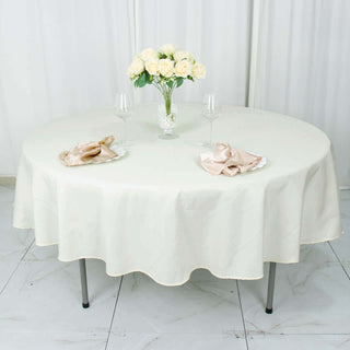 Elevate Your Event with the 90" Ivory Round Tablecloth Elevate Your Event with the 90" Ivory Round Tablecloth