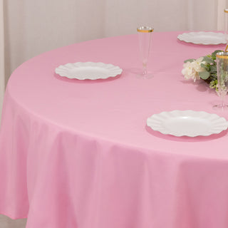 <strong>Wrinkle-Resistant Pink Polyester Round Tablecloth</strong> <strong>Wrinkle-Resistant Pink Polyester Round Tablecloth</strong>