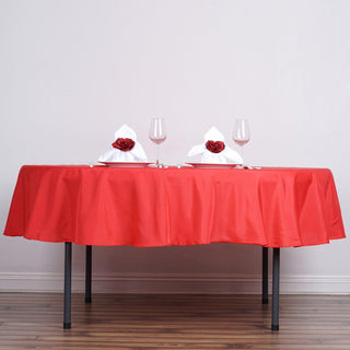 Add Elegance to Your Event with the 90" Red Seamless Polyester Round Tablecloth