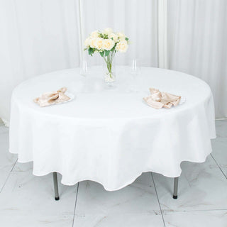 Elevate Your Event with the 90" White Premium Polyester Round Tablecloth Elevate Your Event with the 90" White Premium Polyester Round Tablecloth