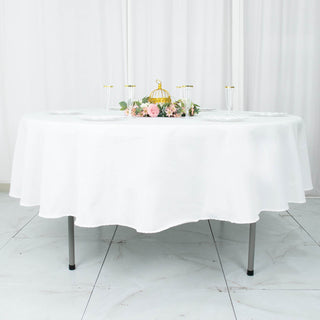 Experience Luxury with the 90" White Seamless Premium Polyester Round Tablecloth