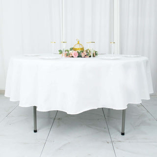 Experience Luxury with the 90" White Premium Polyester Round Tablecloth Experience Luxury with the 90" White Premium Polyester Round Tablecloth