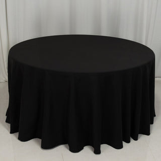Black round tablecloth with elegant draping