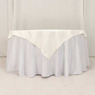 <span>Elegance with Ivory Cotton Blend Table Overlay</span> <span>Elegance with Ivory Cotton Blend Table Overlay</span>