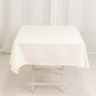 <strong>Seamless Elegance with Ivory Cotton Blend Tablecloth</strong> <strong>Seamless Elegance with Ivory Cotton Blend Tablecloth</strong>