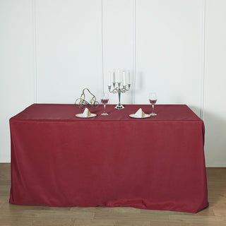 Elevate Your Event with the 6ft Burgundy Fitted Polyester Rectangular Table Cover Elevate Your Event with the 6ft Burgundy Fitted Polyester Rectangular Table Cover
