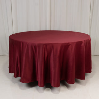 <strong>Effortless Elegance with the Burgundy Lamour Satin Round Tablecloth</strong> <strong>Effortless Elegance with the Burgundy Lamour Satin Round Tablecloth</strong>