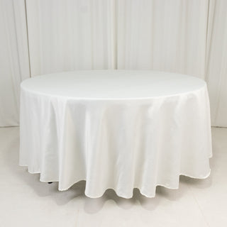 <strong>Effortless Elegance with the Ivory Lamour Satin Round Tablecloth</strong> <strong>Effortless Elegance with the Ivory Lamour Satin Round Tablecloth</strong>