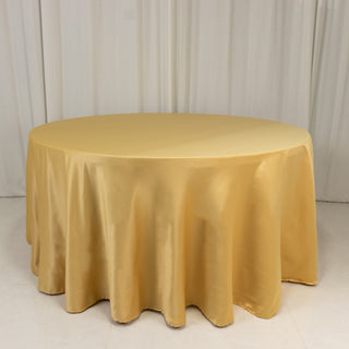 <strong>Seamless Champagne Lamour Satin Round Tablecloth 120”</strong> <strong>Seamless Champagne Lamour Satin Round Tablecloth 120”</strong>