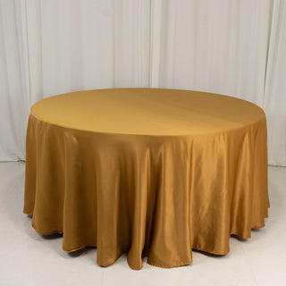 <strong>Seamless Gold Lamour Satin Round Tablecloth 120”</strong> <strong>Seamless Gold Lamour Satin Round Tablecloth 120”</strong>