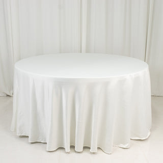 <strong>Seamless Ivory Lamour Satin Round Tablecloth 120”</strong> <strong>Seamless Ivory Lamour Satin Round Tablecloth 120”</strong>