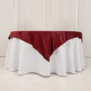 <strong>Exquisite Burgundy Lamour Satin Table Overlay</strong> <strong>Exquisite Burgundy Lamour Satin Table Overlay</strong>
