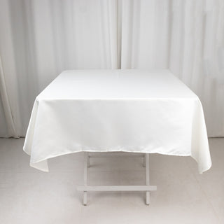 <strong>Exquisite Ivory Lamour Satin Tablecloth - 54"</strong> <strong>Exquisite Ivory Lamour Satin Tablecloth - 54"</strong>