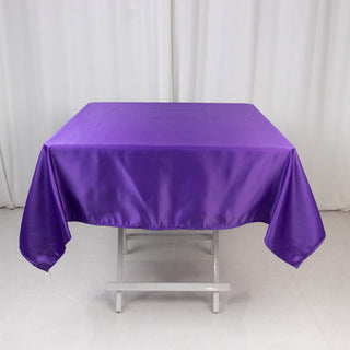 <strong>Exquisite Purple Lamour Satin Tablecloth - 54"</strong> <strong>Exquisite Purple Lamour Satin Tablecloth - 54"</strong>