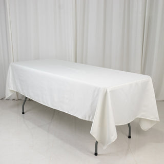 <strong>Sophisticated Ivory Lamour Satin Rectangular Tablecloth</strong> <strong>Sophisticated Ivory Lamour Satin Rectangular Tablecloth</strong>