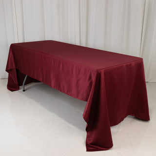 <strong>Burgundy Lamour Satin Rectangle Tablecloth</strong> <strong>Burgundy Lamour Satin Rectangle Tablecloth</strong>