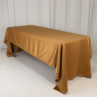 <strong>Gold Lamour Satin Rectangle Tablecloth</strong> <strong>Gold Lamour Satin Rectangle Tablecloth</strong>