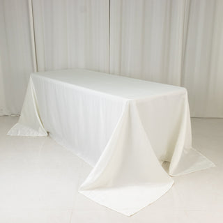 <strong>Luxurious Ivory Lamour Satin Rectangle Tablecloth</strong> <strong>Luxurious Ivory Lamour Satin Rectangle Tablecloth</strong>