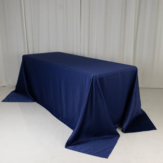 Navy blue tablecloth draped elegantly over a rectangular table