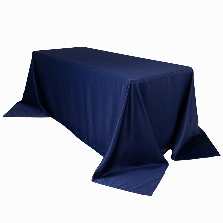 Navy blue tablecloth draped over a rectangular table