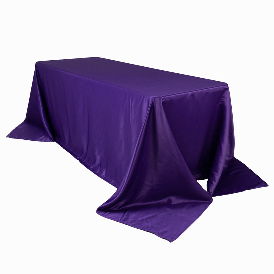 Purple tablecloth draped elegantly over a rectangular table