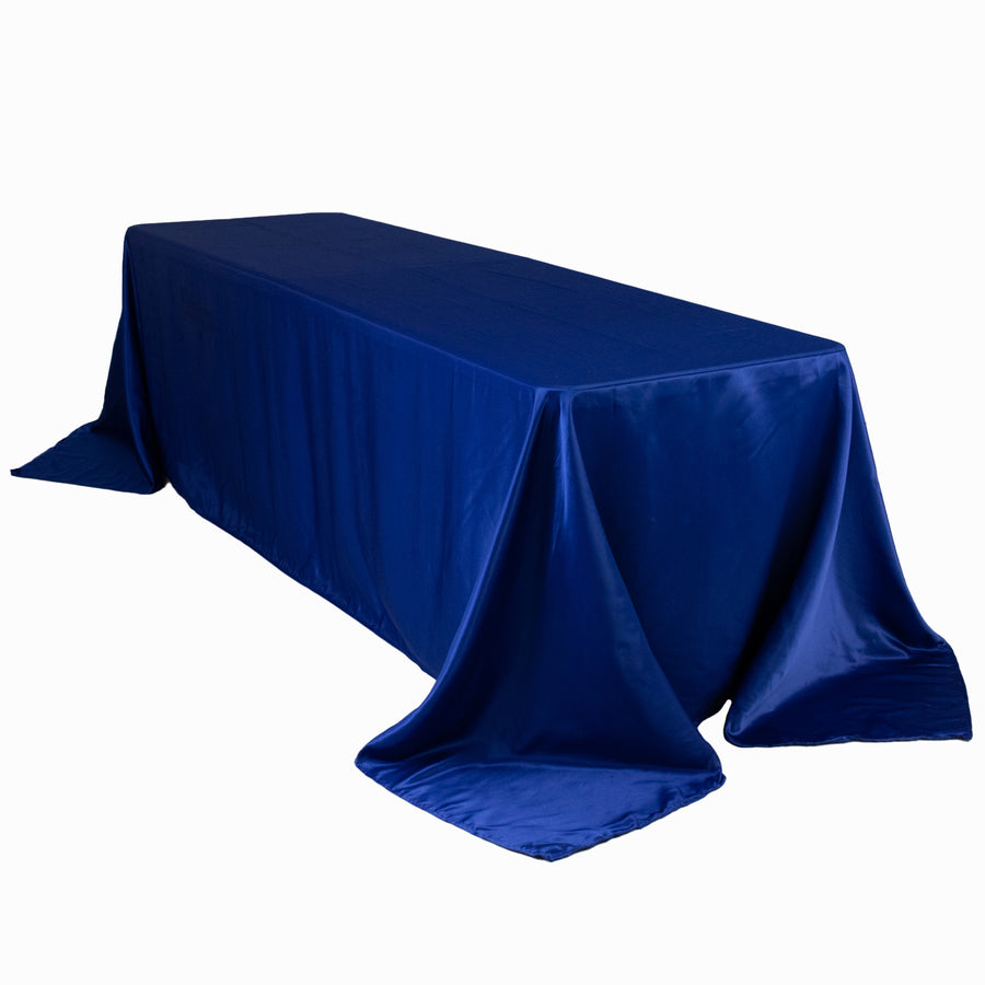 Blue satin tablecloth draped elegantly over a long table.