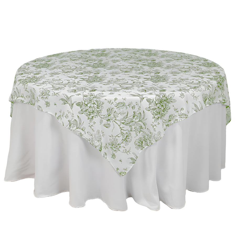 Floral round tablecloth with green designs on a white background.