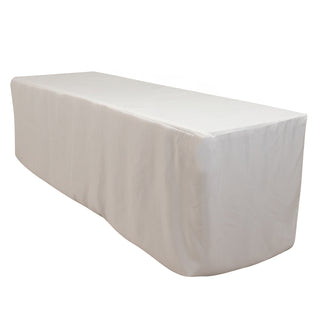 White table cover draped over a rectangular table
