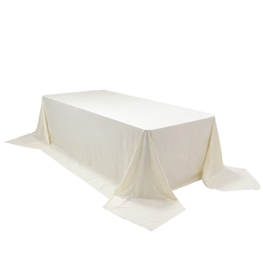 White tablecloth draped over a rectangular table