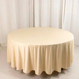 <strong>Premium 108" Round Beige Scuba Tablecloth</strong> <strong>Premium 108" Round Beige Scuba Tablecloth</strong>