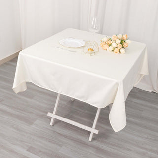 Experience the Allure of Ivory with the Wrinkle Free Square Tablecloth Experience the Allure of Ivory with the Wrinkle Free Square Tablecloth