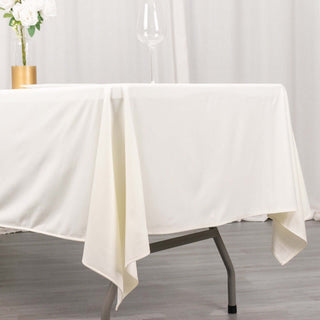 Create a Sophisticated and Sleek Event Decor with Our Ivory Premium Scuba Polyester Tablecloth Create a Sophisticated and Sleek Event Decor with Our Ivory Premium Scuba Polyester Tablecloth