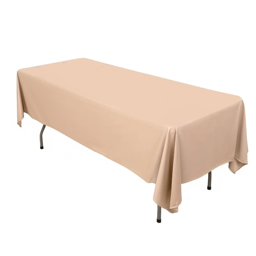 Beige tablecloth draped over a folding table